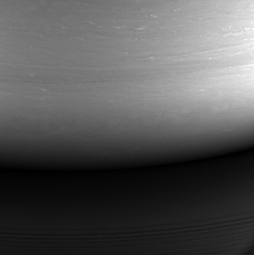 Последната снимка, изпратена от Касини, е тази черно-бяла визия от горната атмосфера на втората по големина планета в Слънчевата система.